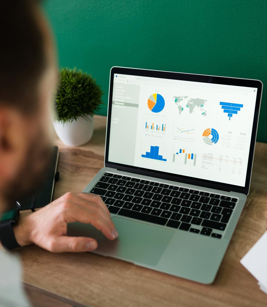 Photo-of-a-laptop-on-a-desk-with-SEO-analytics-and-search-engine-optimization-workspace